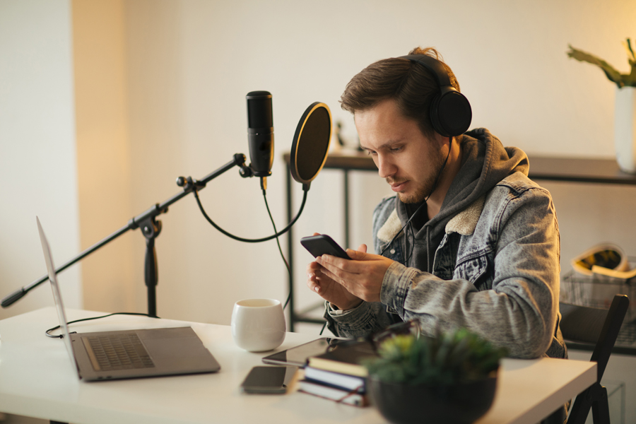 a man recording his podcast