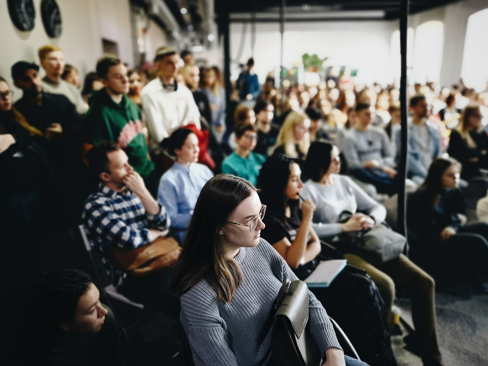 Group of people attending a conference